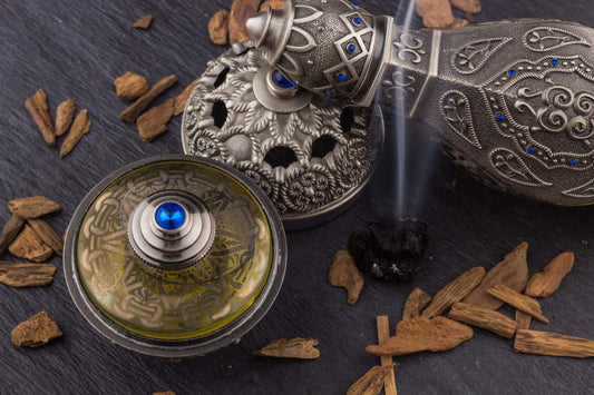 Close-up of pure oud oil and wood resin representing authentic luxury fragrance quality and craftsmanship